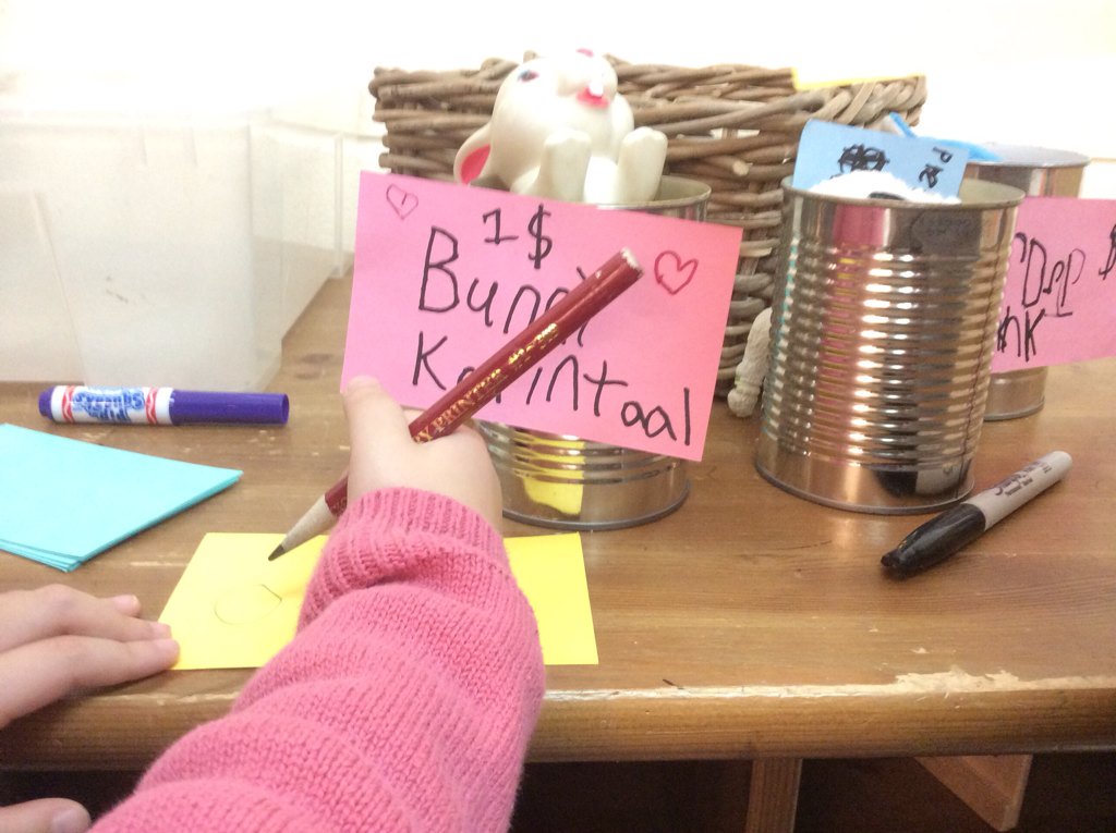 Ss creating signs for our pet store