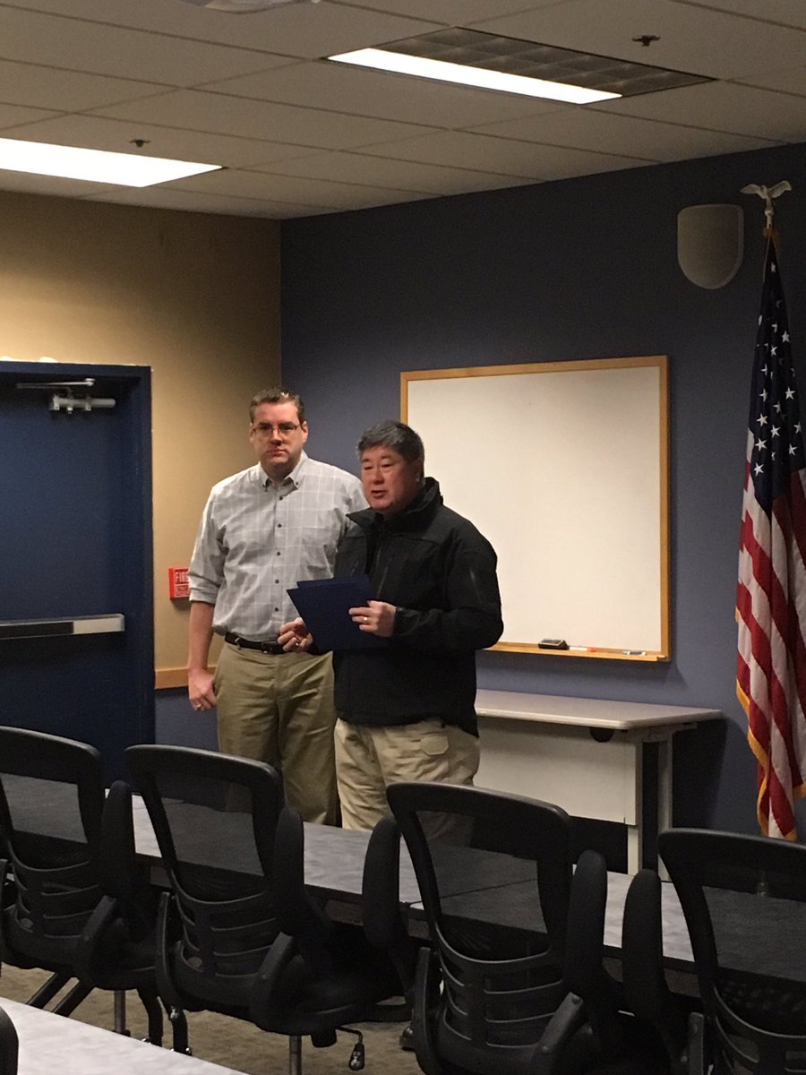 BellinghamPD's tweet photo. Shane Kussmann Dispatcher receiving a letter of commendation from Chief Cook for his years of work with "Make a wish" #thatshowwedoit!bpd117 https://t.co/LjFlqeTEh5