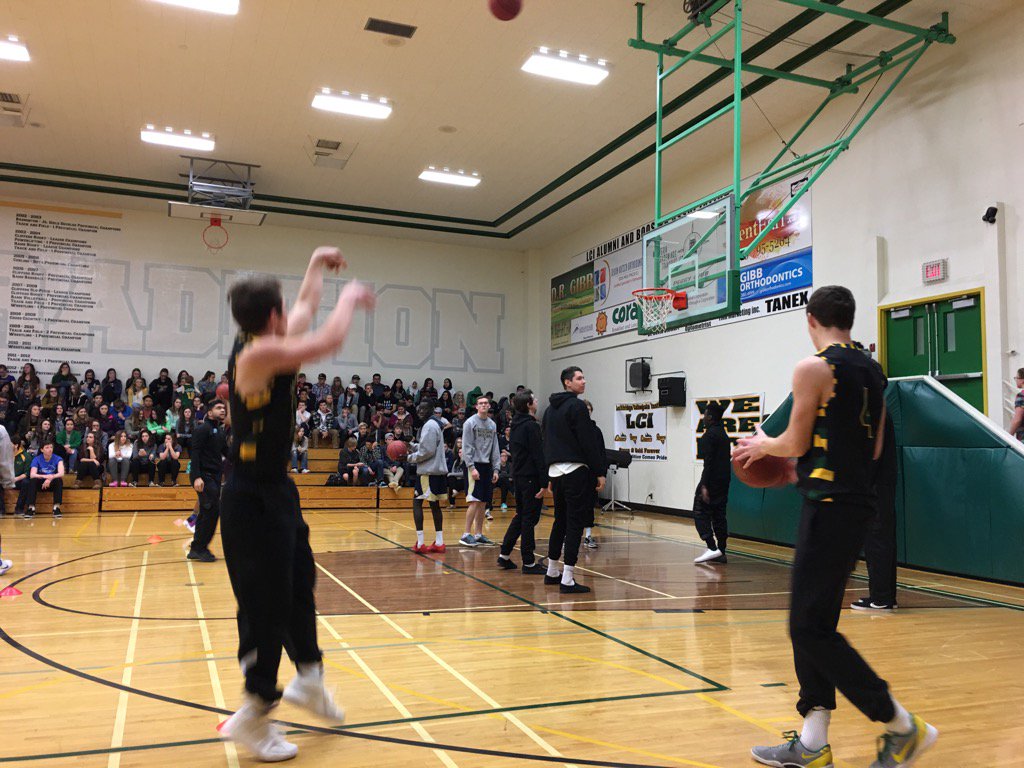Players warming up for the three-point contest <a href="/LCIAthletics/">LCI Athletics</a> during opening ceremonies for today's Green and Gold