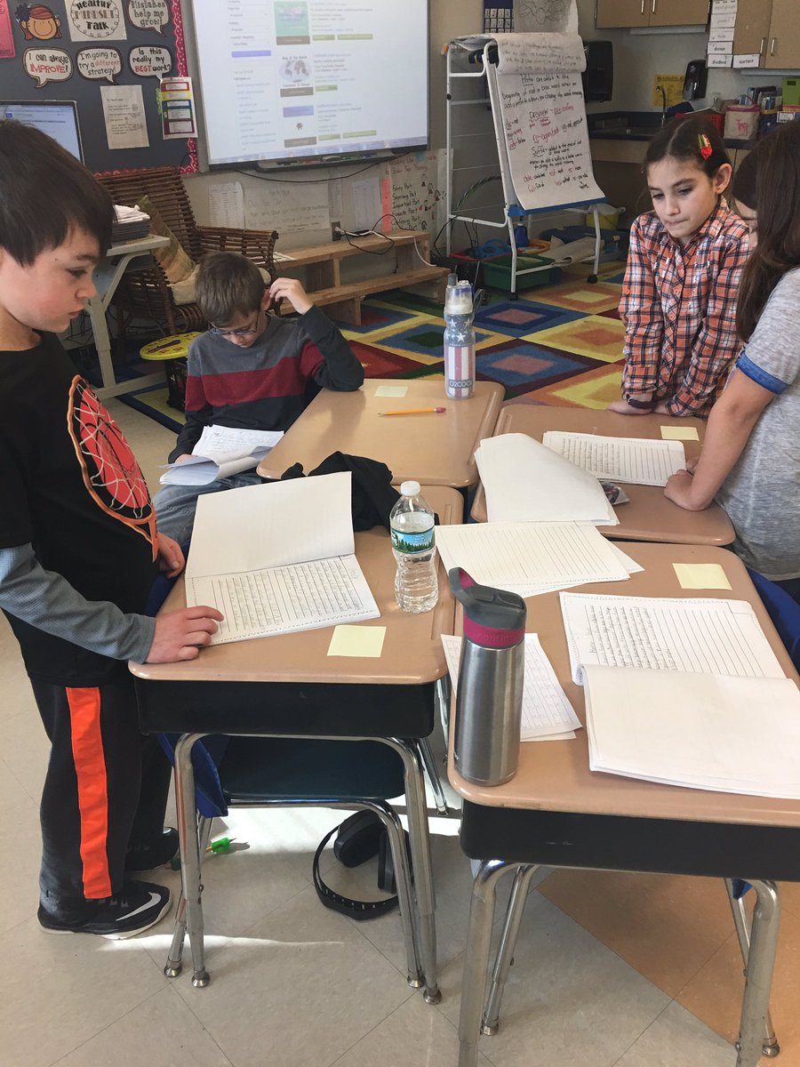 Students celebrating one another's nonfiction stories by reading their classmates stories and then leaving a compliment for them!!!!