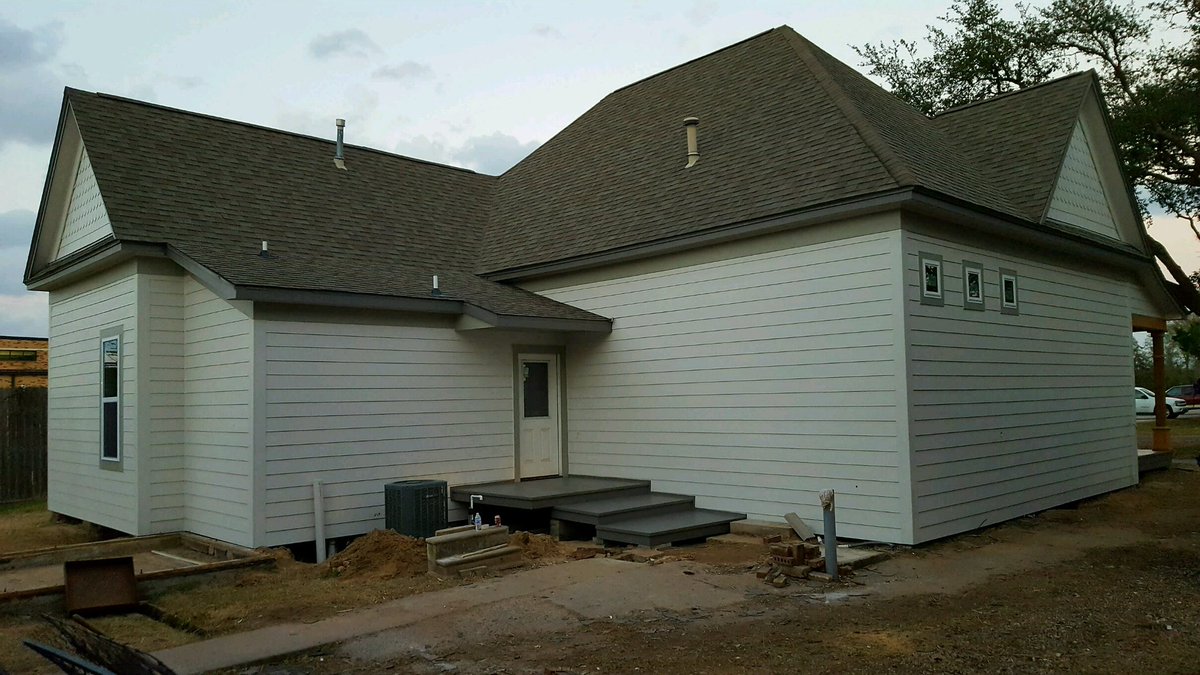 Hardie installed and the painting is finished