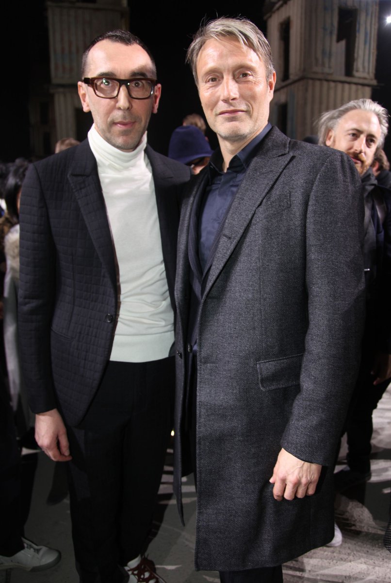 MadsSource's tweet photo. 5 HQ Pics of Mads and Hanne at Milan Fashion Week Men's - Ermengildo Zegna Show https://t.co/yliCrhQp7X #MadsMikkelsen https://t.co/GgxfIbfsci