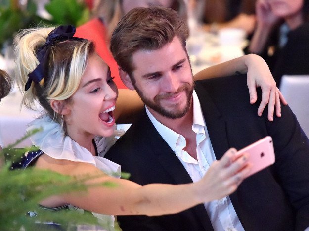 Shocker: Miley Cyrus And Liam Hemsworth Continue To Be The Cutest Couple On The Plane...  