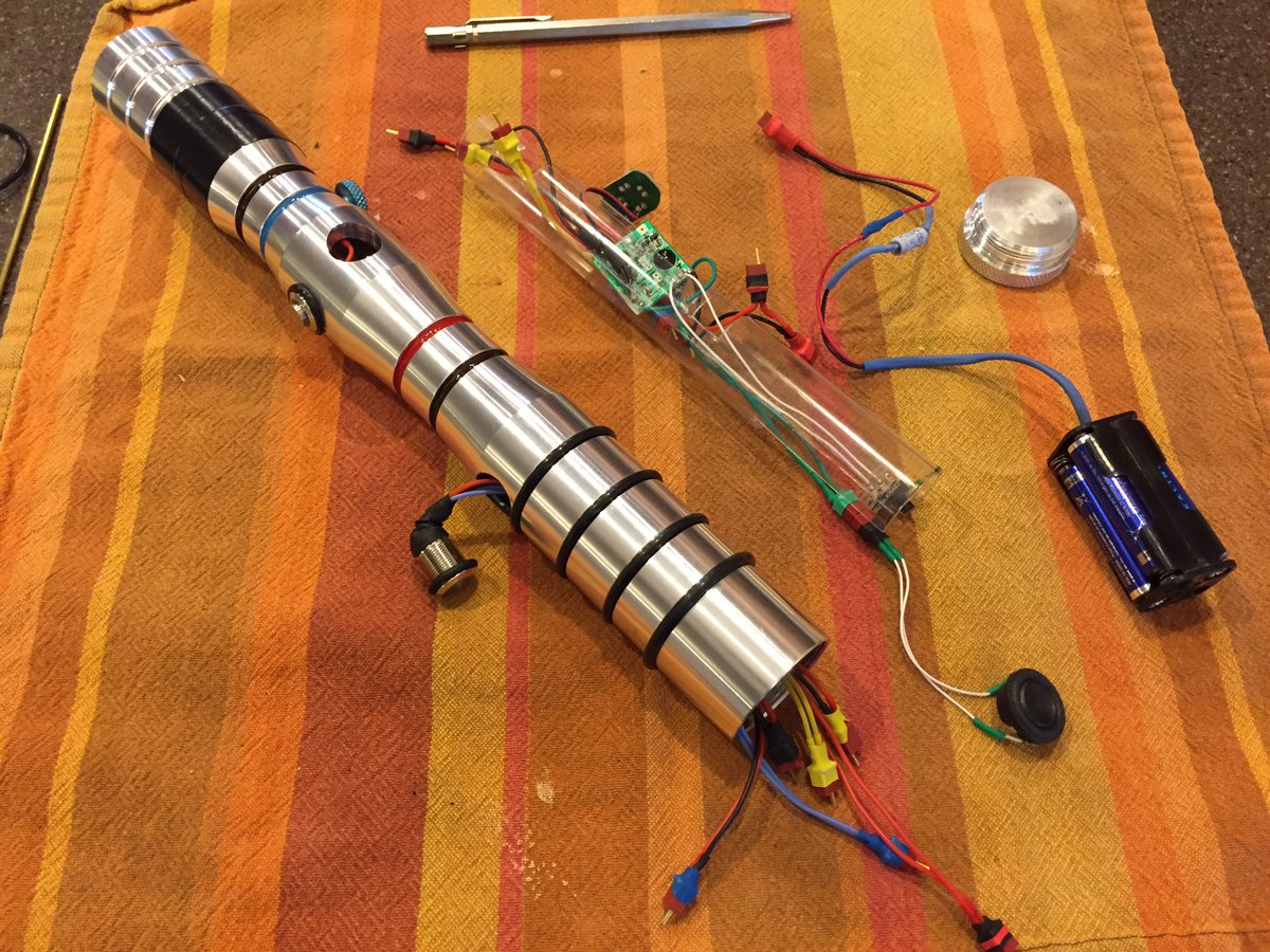 moorecreativeco's tweet photo. I've just finished electronics assembly in the hilt and some almost-final assembly... #DNNSummitSaber looking good! https://t.co/0TbXZbnRRr https://t.co/VXEP58ip2e