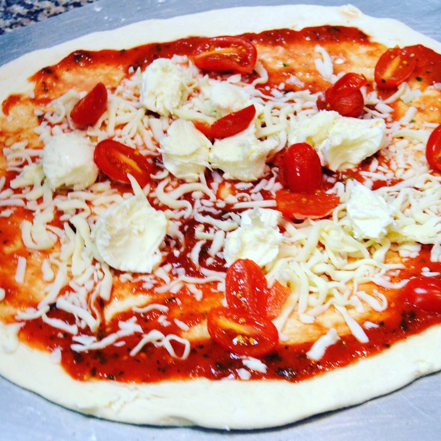 A rare behind the scenes view of our pizza before the are put in the oven.  #pizza #mississauga #oakville #brampton