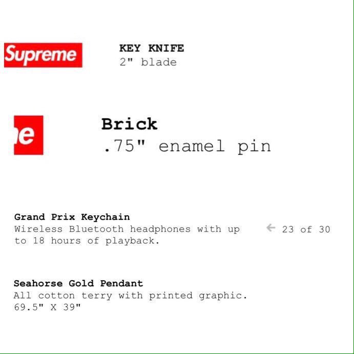 supreme grand prix keychain