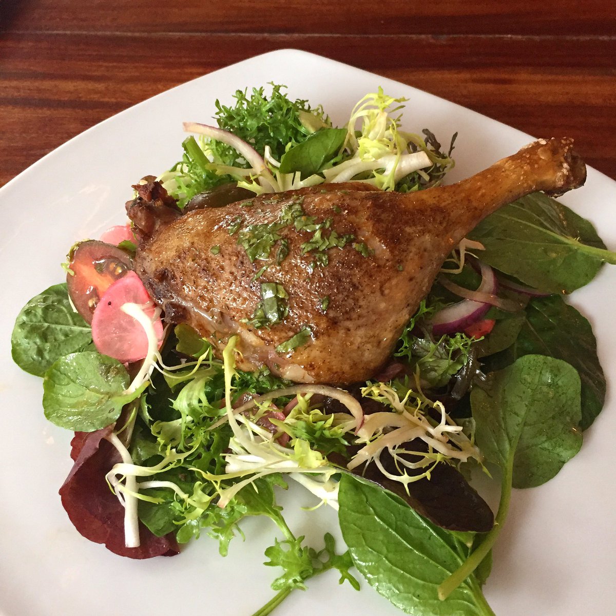 GrondinKitchen's tweet photo. Duck Salad | market greens, pickled raisins, radish, heirloom cherry tomato, aji amarillo vinaigrette #frenchlatin #hawaii #Chinatown #duck https://t.co/UeP624EGqq