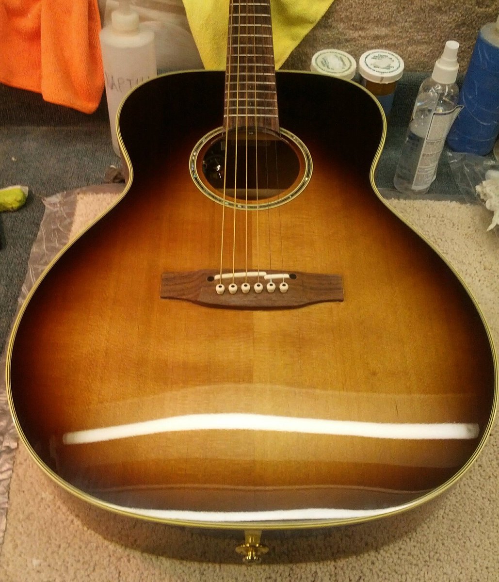 guitarfinishing's tweet photo. How better to hide top repairs than a #sunburst? #Takamine #guitarfinish #luthier #vancity #tobaccoburst #VGF #guitarbuilder #UVpoly #guitar https://t.co/iNpjCaY918