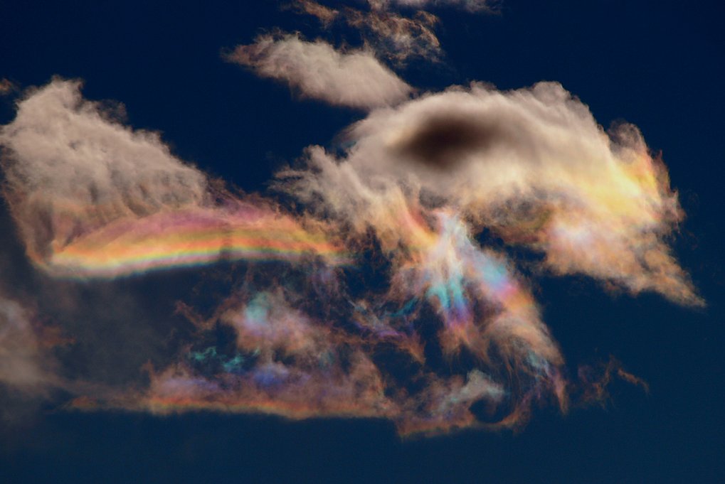 Advil's tweet photo. an atmospheric phenomenon called circumhorizontal arc: when the sun is at least 58º above horizon and ice crystals in clouds form rainbows. https://t.co/0YOKuOV10H