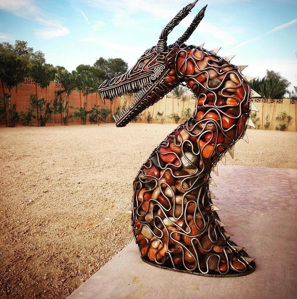 Upvoted: Dragon made from river rock and steel rods via /r/ ift.tt/2jUMqk7 ift.tt/2jNVSBs