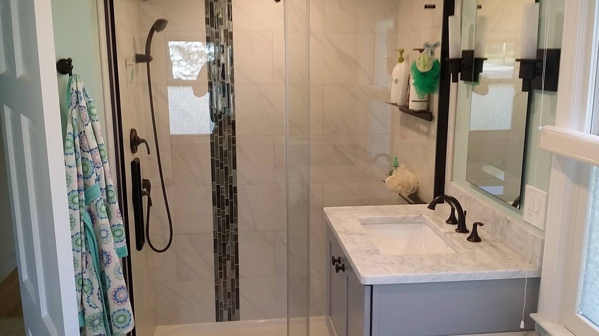CypressDesignCo's tweet photo. #mosaicmonday Add some flair to your shower walls with @daltile tiger eye glass mosaic.#MAAX #Daltile #tigereyeglassmosaic #RIBathroom https://t.co/rInNlxUbZ2