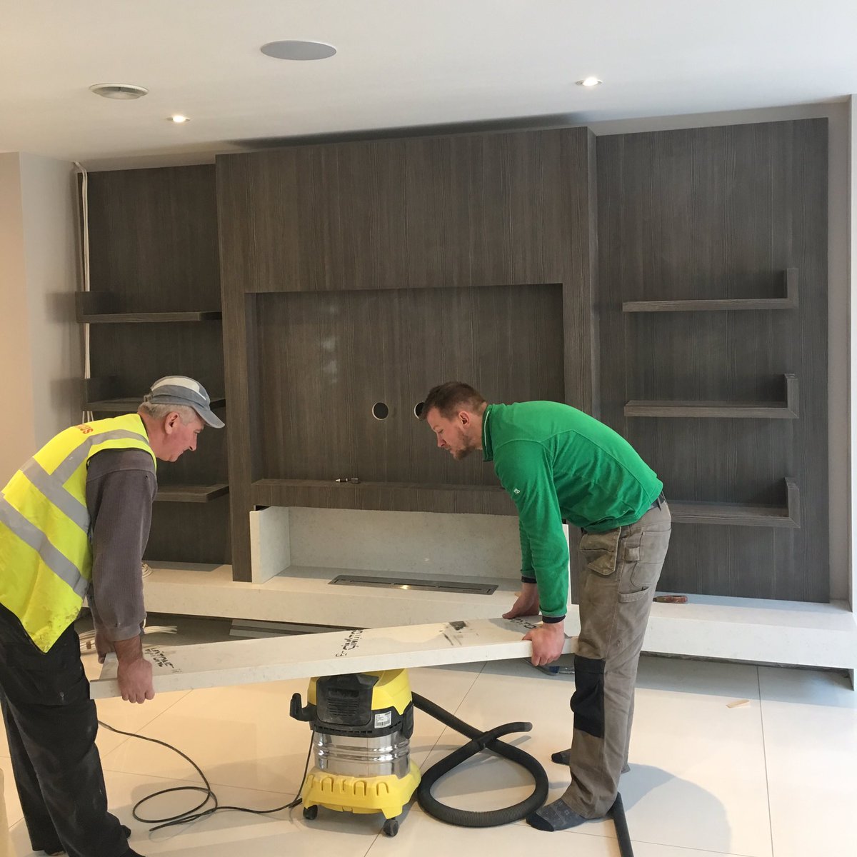 atlanticintdes's tweet photo. Our #joinery and #fireplace design coming together on site #shelves #wood #marble #livingroom #interiordesign https://t.co/D5qeSgUtOr