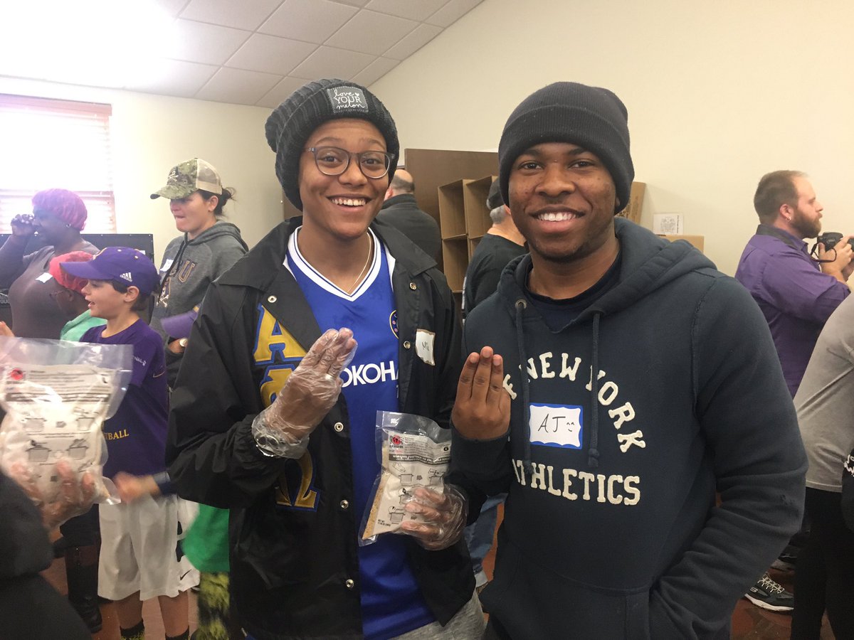APO_ECU's tweet photo. Just a couple brothers participating at Stop Hunger Now on MLK Day of Service 💙💛💙💛 https://t.co/V88EXwK8I9