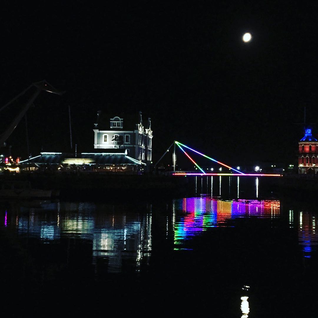 CapeTownEtc's tweet photo. Add some colour to your Monday by having fabulous night! Image by @skyfall_ryan 
#nighttime #citylights #VandAWaterfront #BasculeBar https://t.co/vt5zhb1iRC