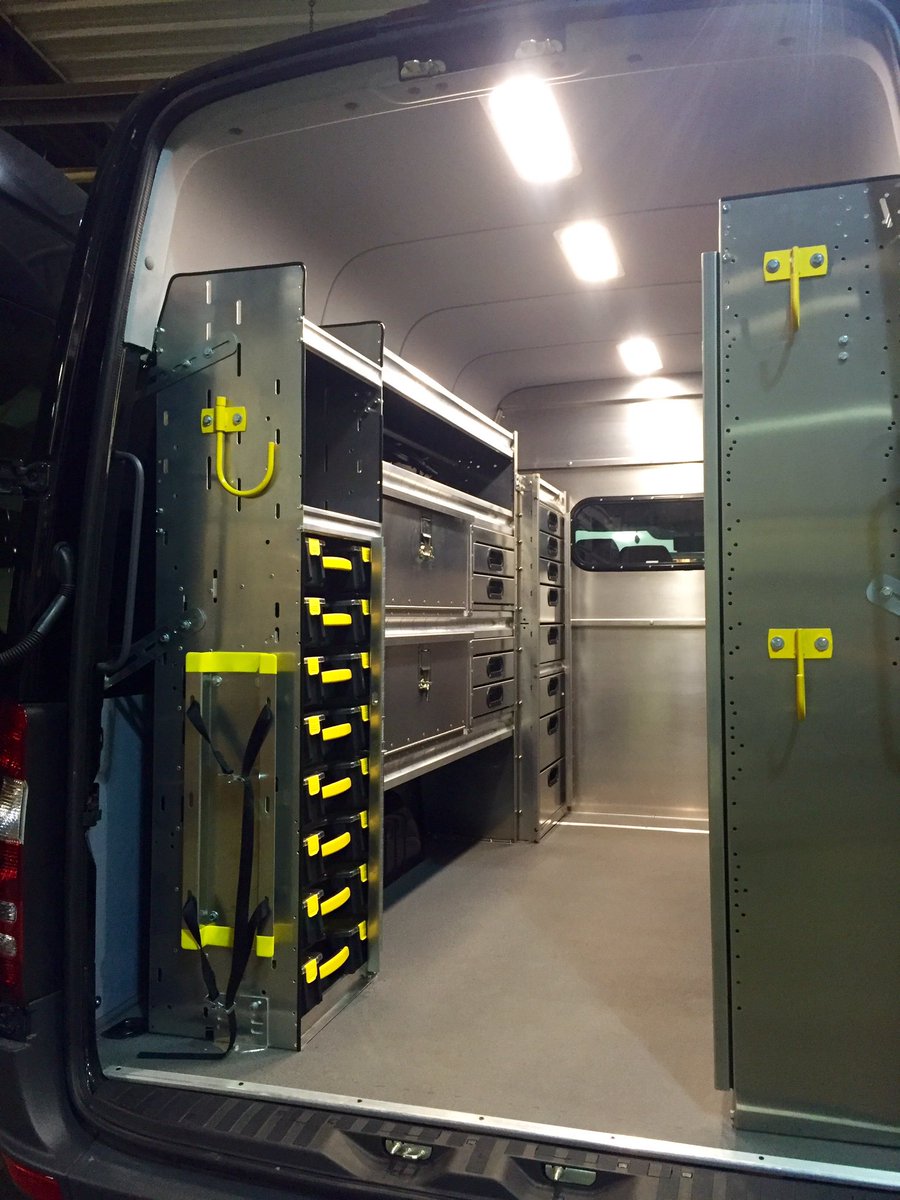 SuperiorCDesign's tweet photo. Sprinter 170 crew van #upfit. Partition, shelving, LED lighting, workbench, partskeeper &amp; drawer cabinets, locker, hooks, etc #RangerDesign https://t.co/kzwaa1289b