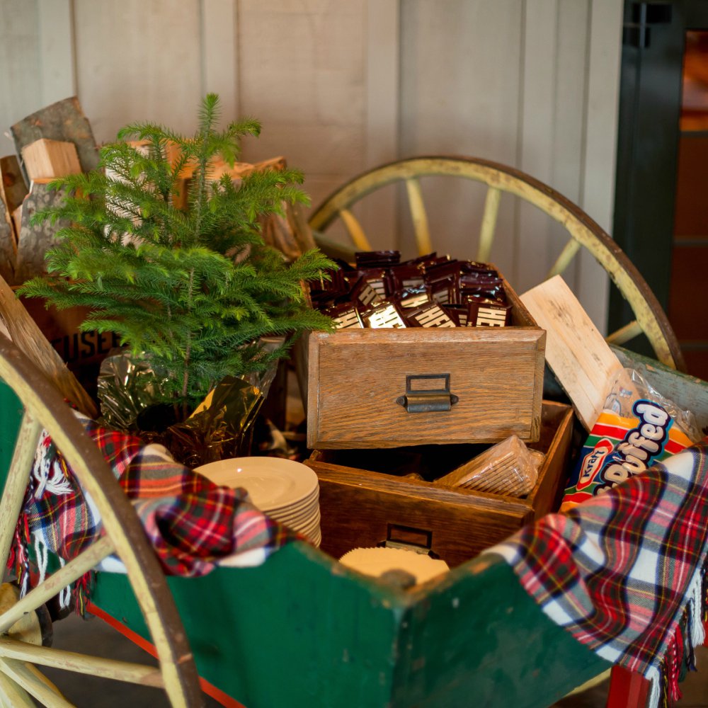 Plaid and the coziest s'mores bar on the terrace. #corkevents