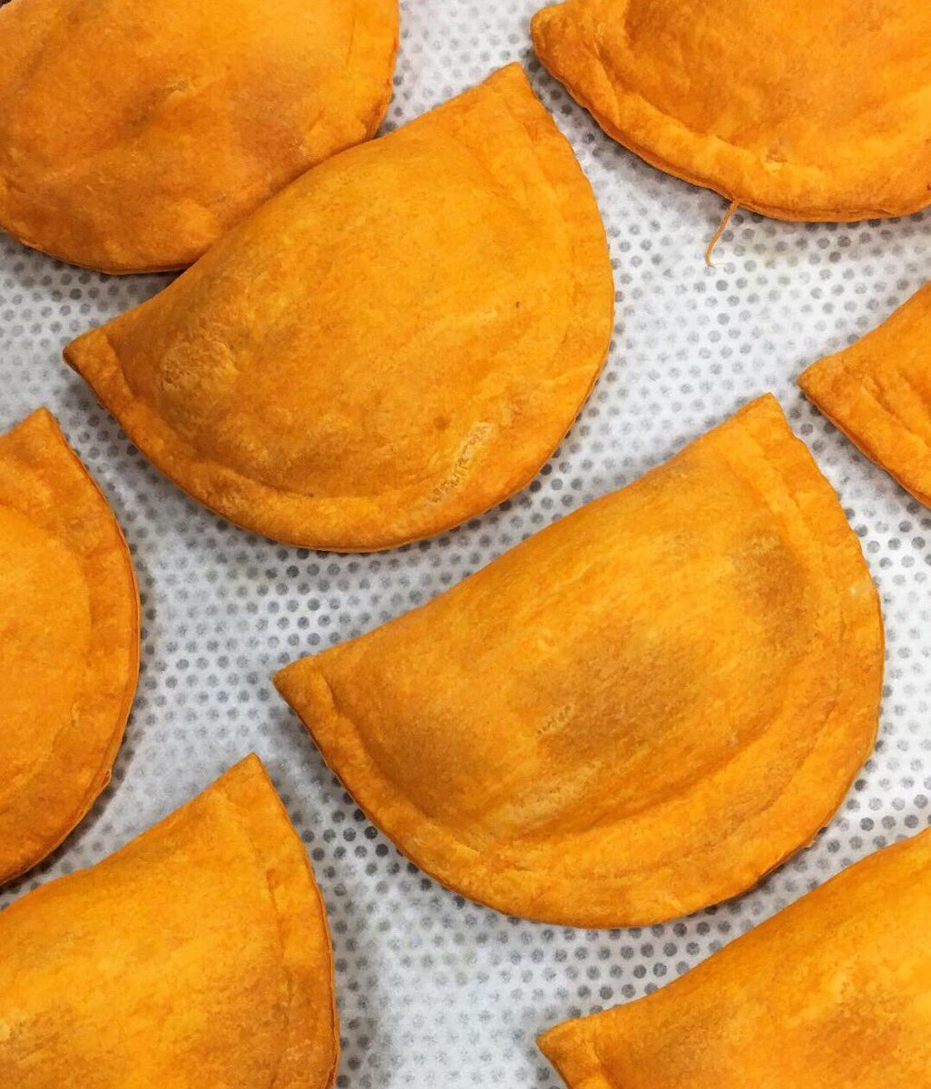 VisitHamiltonCo's tweet photo. DYK: @GrillReggae makes 60-80 dozen Jamaican patties weekly? Watch our Instagram story to see how they're made! #VisitHC #HCEats https://t.co/TeWZX0PUTU