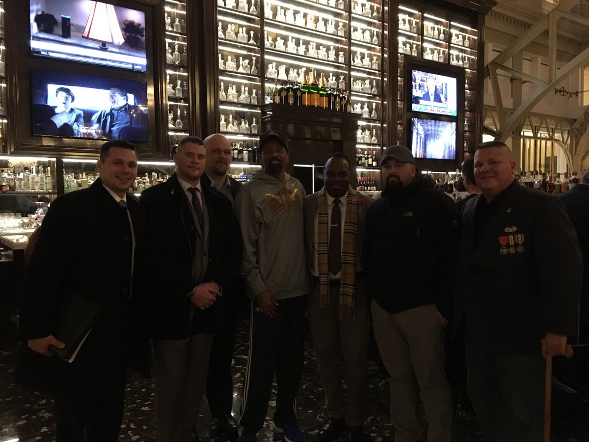 SheriffClarke's tweet photo. Miltary vets. Some special forces, some Purple Heart recipients at Trump International Hotel in DC for inaugural. Said vets have my back. https://t.co/5GgoXCvLij
