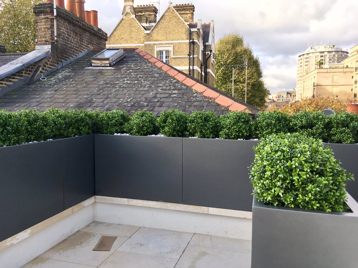Europlanters's tweet photo. Small #rooftop #balcony brightened up with #planters &amp; #topiary #London #garden #design  We love the #cloudtrees on this project. https://t.co/1CdJzdrd4i