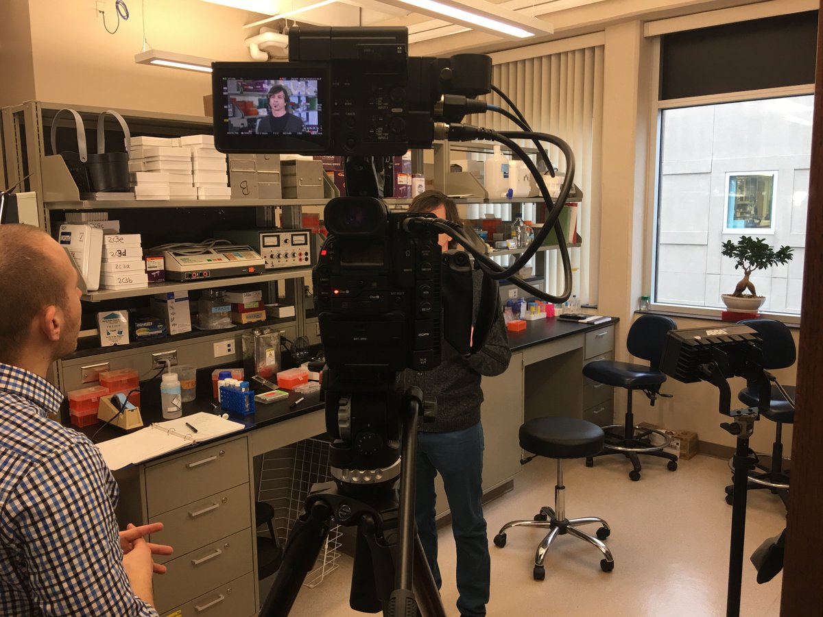 Back in the lab talking about cancer research.