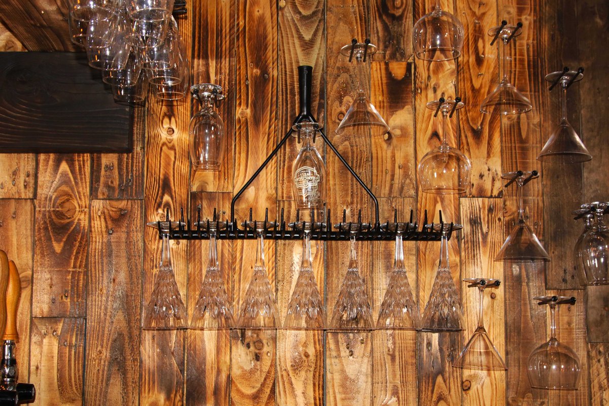 staveandchime's tweet photo. Our bar and all our tables are made from recycled materials! Who knew a rake would be the perfect glass holder!  @FranWellBrewPub https://t.co/JNqqFunrCi