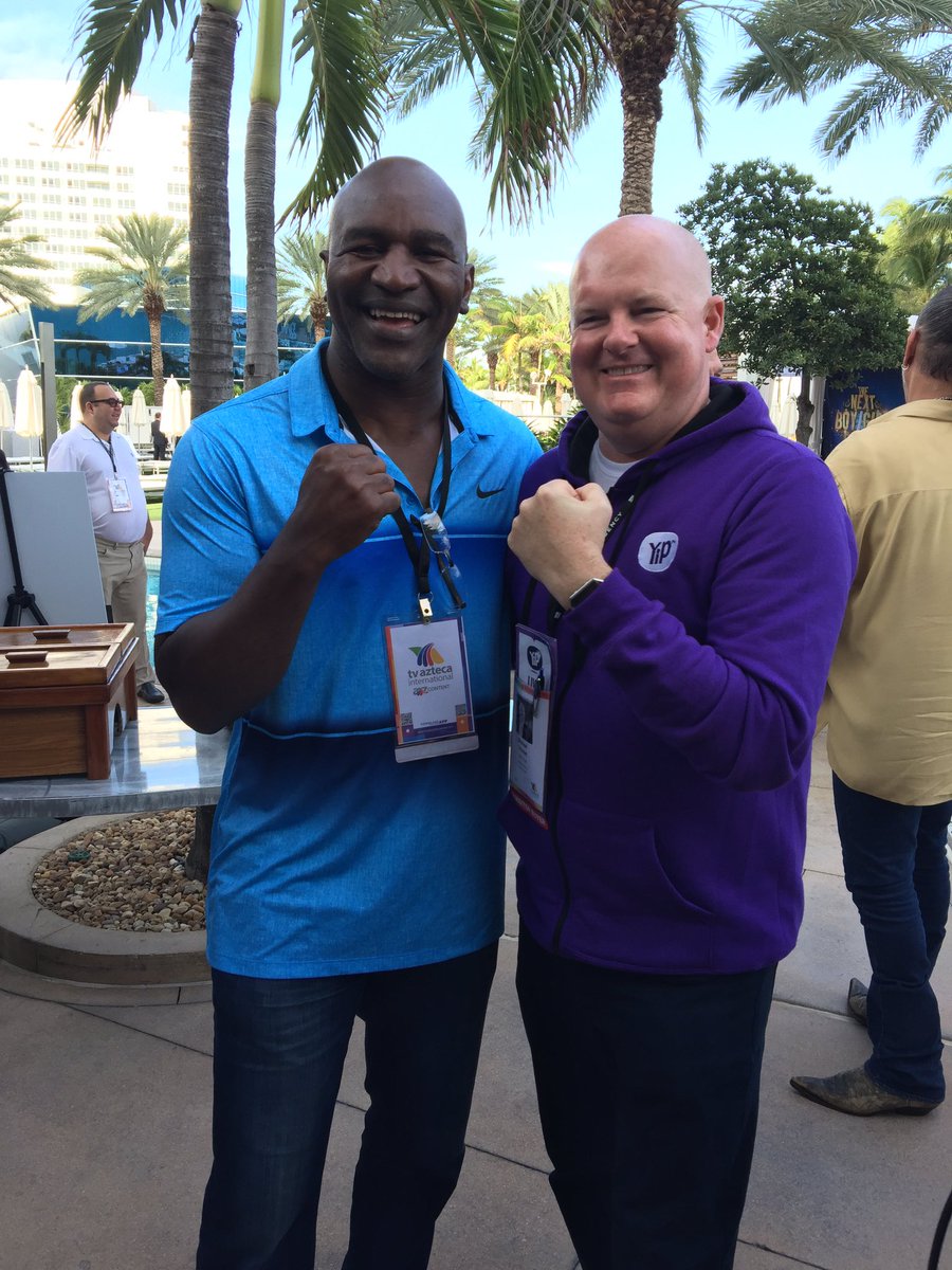 YipTV's tweet photo. .@holyfield and @YipTV CEO @mtribolet having a knockout time at @NATPE in Miami, Fl @Fontainebleau #ott #mobilecable #NATPE2017 https://t.co/c6y4MpYME8