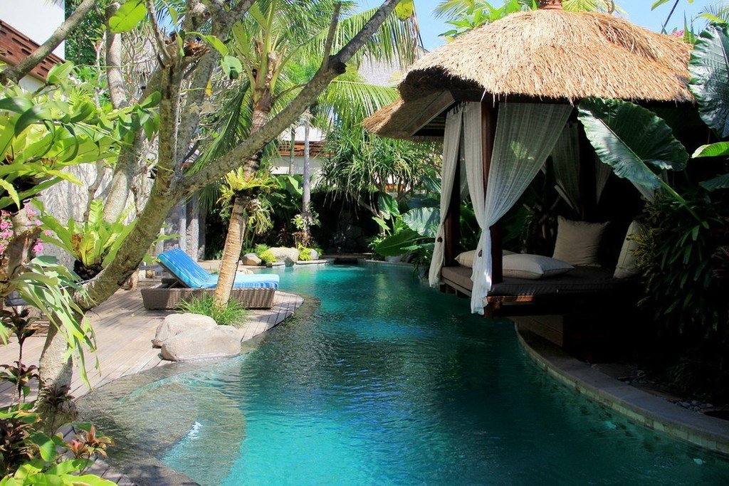 BaliLandscapeCo's tweet photo. The decking and lush gardens combine to make this poolside area heavenly day and night.

#… https://t.co/HIkegoSUXc https://t.co/thThIXFXDM