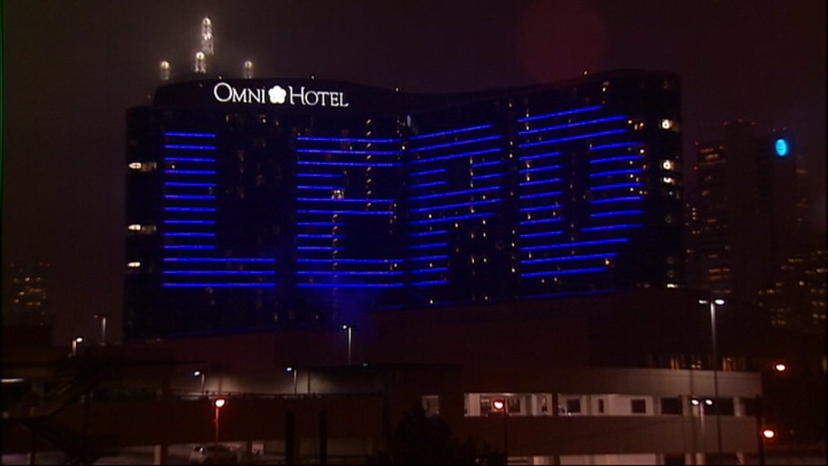 FOX4's tweet photo. Omni Hotel in Downtown Dallas paying tribute to slain Det. Jerry Walker and the Little Elm Police Department https://t.co/yqdAaryL9Y