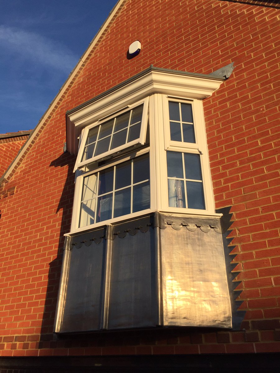 LLeadwork's tweet photo. Lead vertical cladding to bay window with wood rolls feature. #leadwork #baywindow #lead #stepflashing #scollops https://t.co/GG87WYf2do