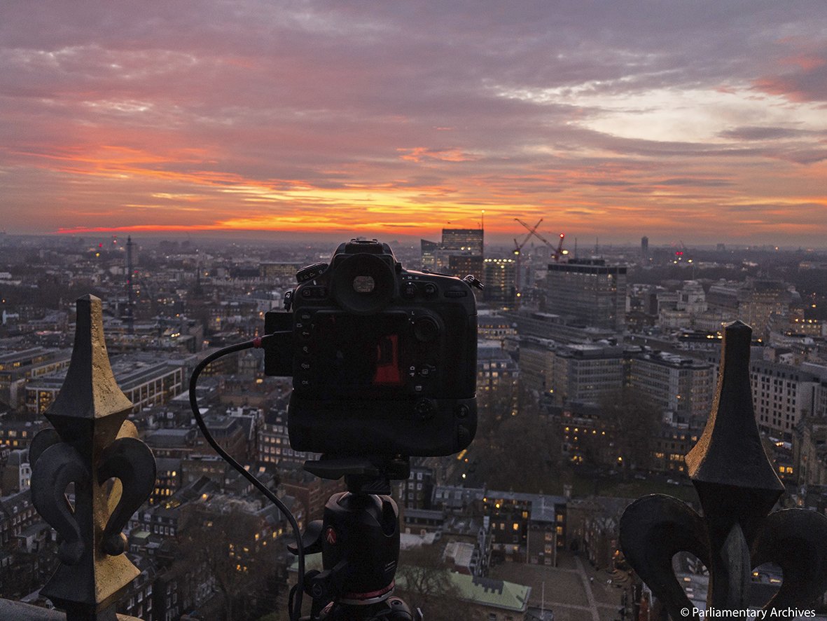 UKParlArchives's tweet photo. #BehindTheScenes this week the #ImagingTeam inspired by the work of Benjamin Stone MP, photographed a sunset from the #VictoriaTower roof https://t.co/eaT4ftytZF
