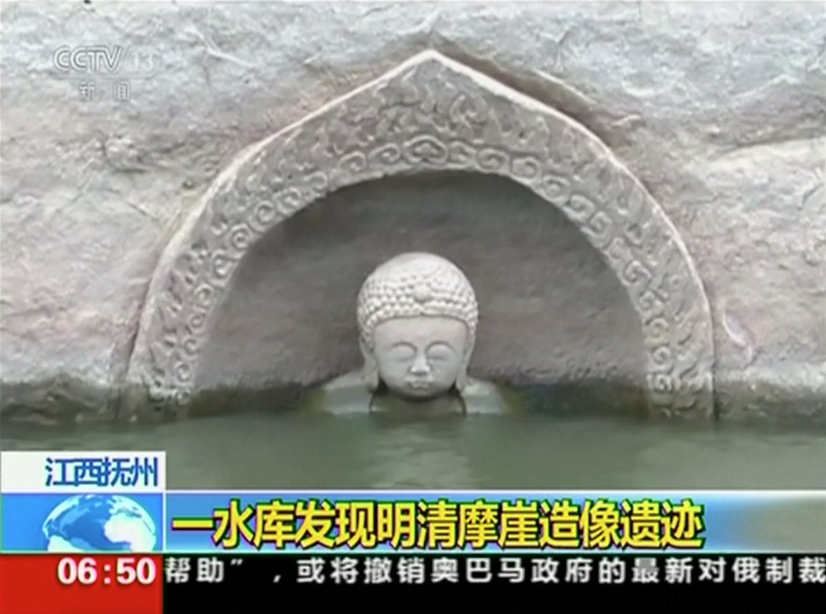 Chinese archaeologists are studying an old Buddha statue found in a