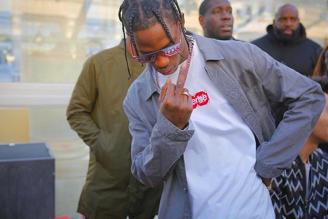 Travis Scott Wears Louis Vuitton x Supreme During Louis Vuitton