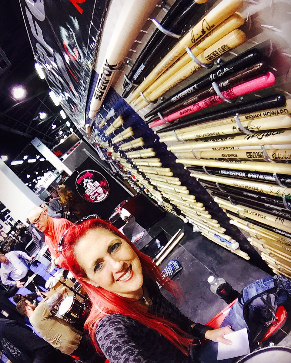 drummerapril's tweet photo. @bccsi represented at the #Silverfox booth at @NAMM Drummathon sticks on the wall and our head hanging in the background! RAWK #NAMM2017 https://t.co/FNddNqgpbx