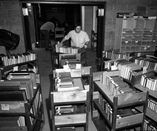 indianastate's tweet photo. #TBT to 1973 as books are moved from Normal Hall to the new Cunningham Memorial Library (Martin's Photo Shop). #Stateis150 https://t.co/zevFF53idM