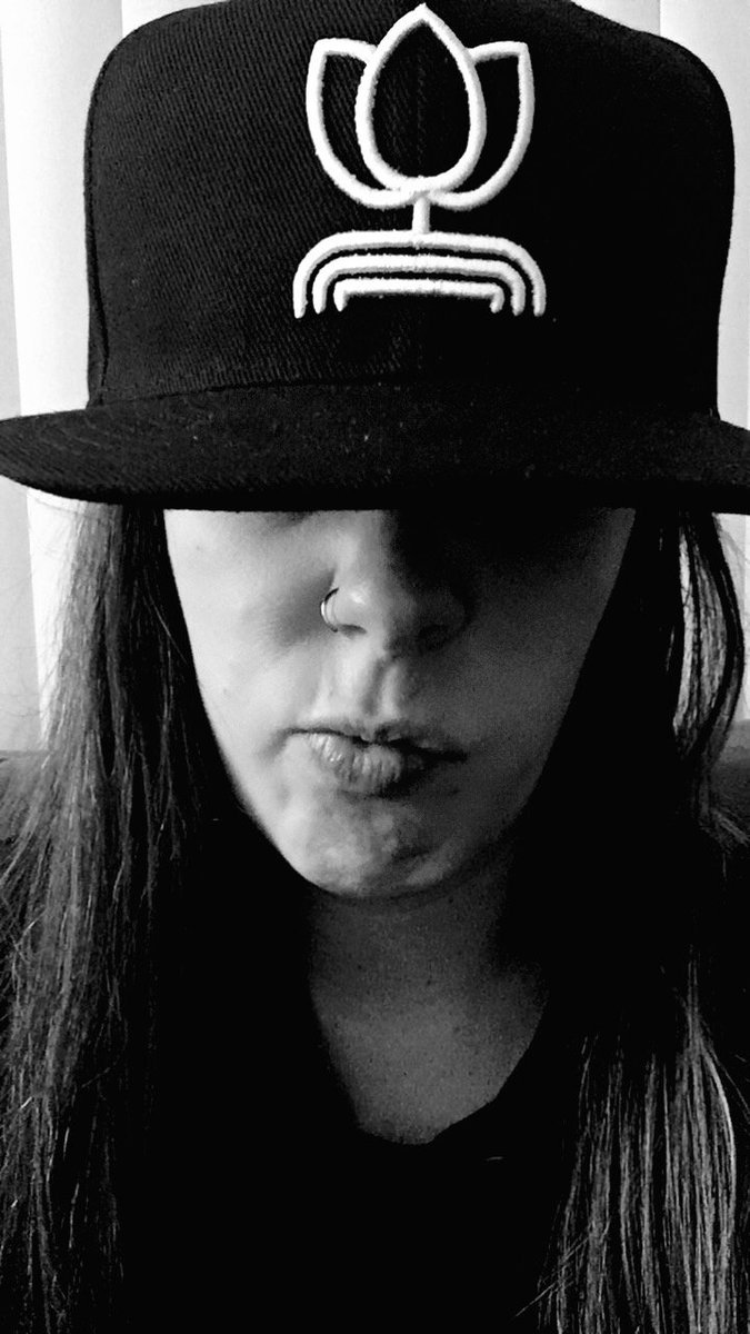 GenHydro's tweet photo. Kirby showing off her sweet new hat. Thanks for the support! #generalhydroponics #cantstopwontstop #swag #socal #blackandwhite https://t.co/j02UYndmlp