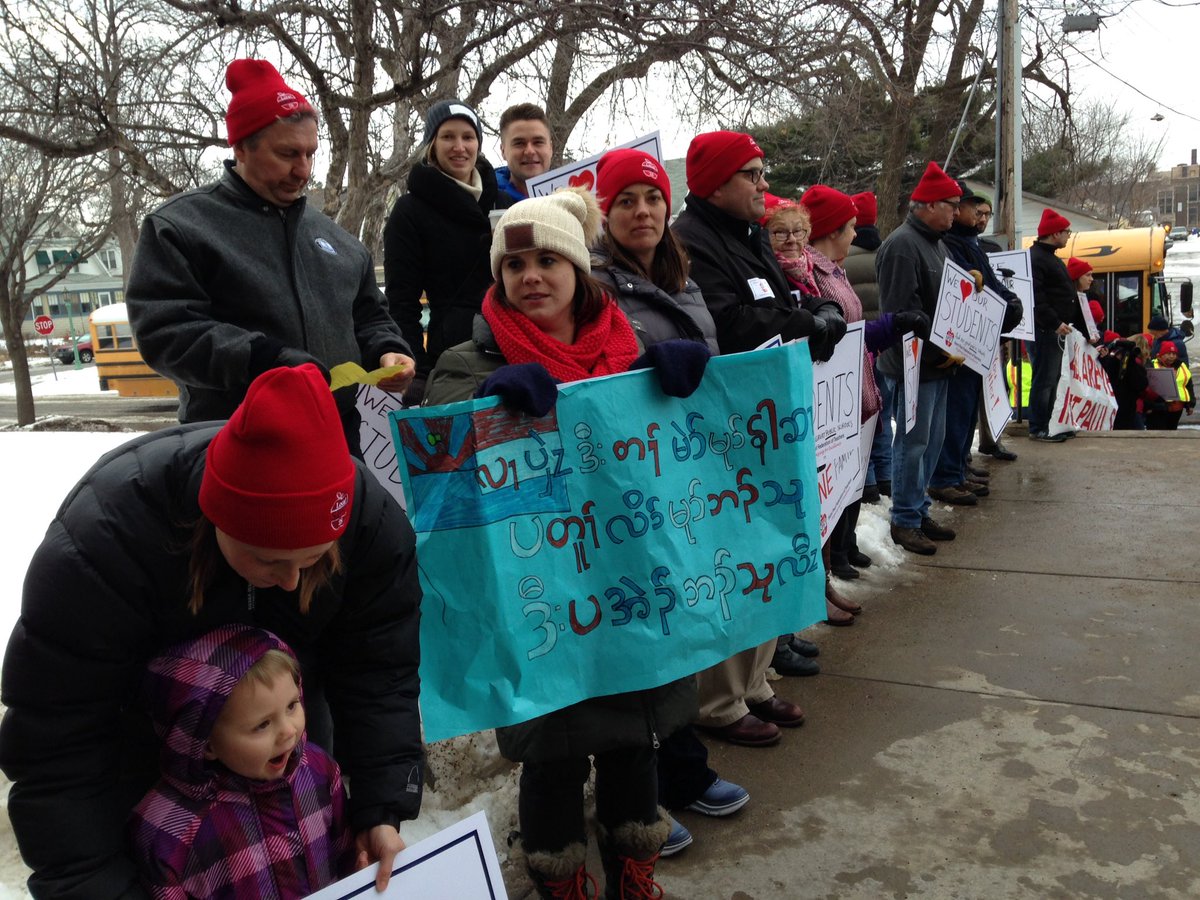unionadvocate's tweet photo. Teacher, parents, community members letting students at LEAP HS in StPaul, which serves new Americans, know they are "welcome here" @SPFT28 https://t.co/U8GsVPPvec