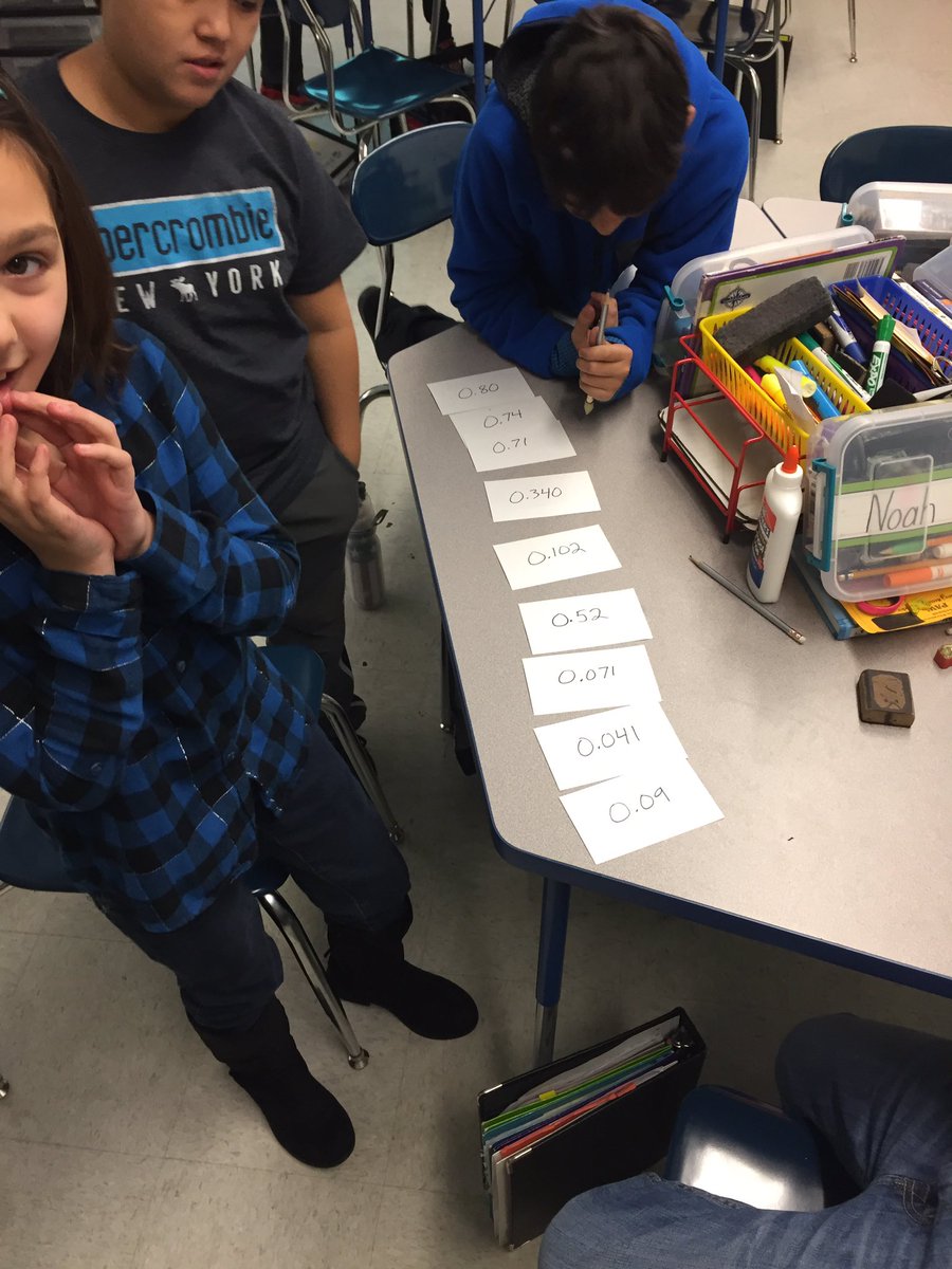 jobrown514's tweet photo. Decimals and place value. Gotta have my friends work together to figure this out. #washingtonsps5 https://t.co/0YvKutXzd1