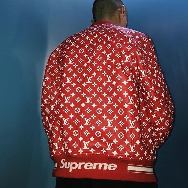 A RED & WHITE LEATHER BOMBER JACKET BY SUPREME, LOUIS VUITTON, 2017