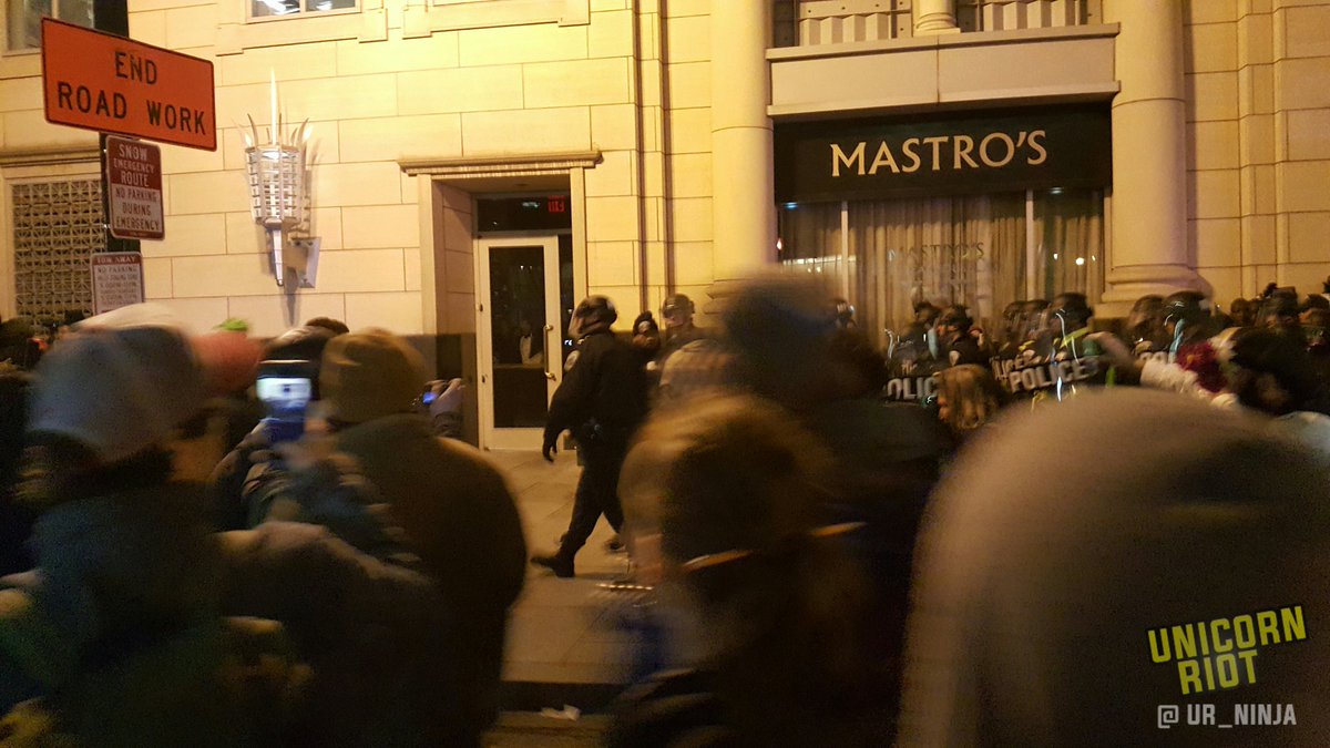UR_Ninja's tweet photo. Police have peppersprayed the crowd while patrons locked down inside restaurants look on #J20 #disruptj20 https://t.co/3kHZQUNg6e https://t.co/cMqrJkyFFt