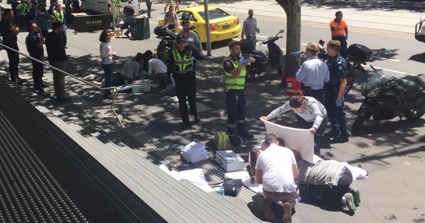 theheraldsun's tweet photo. LATEST: The scene at Bourke St after one killed, many injured as car hits pedestrians. MORE: https://t.co/useMwfd42v https://t.co/NfF8g66WQh