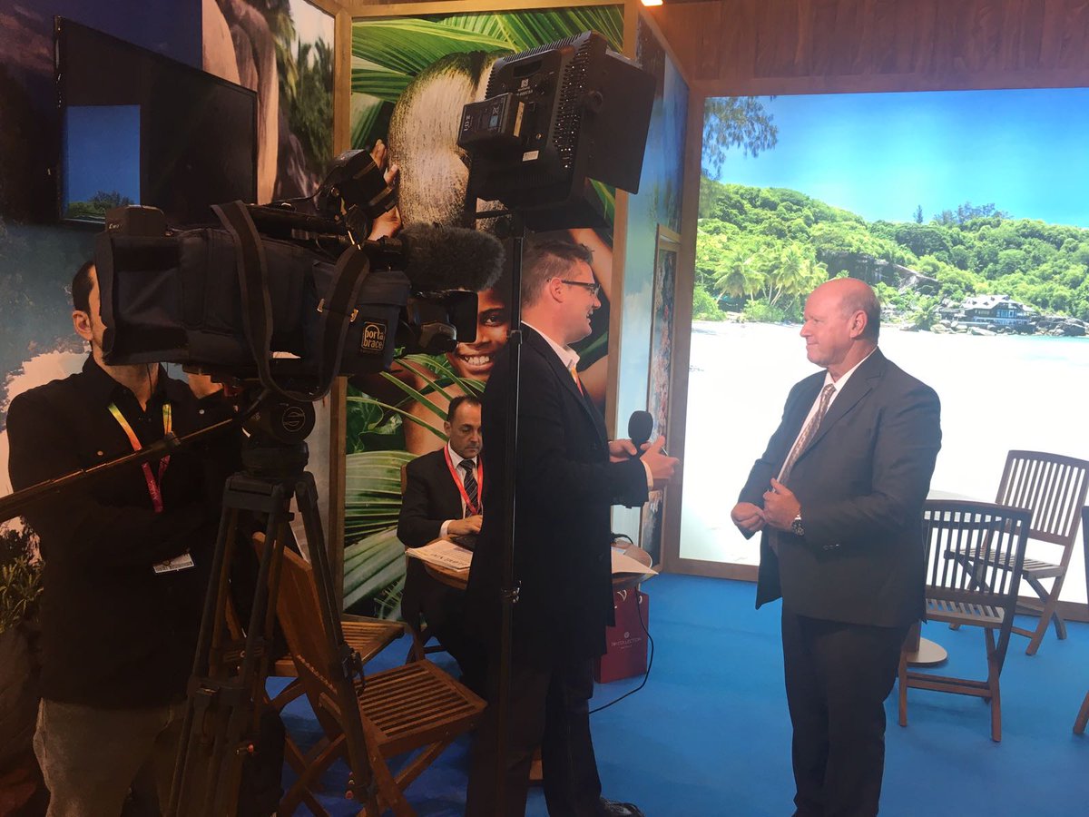 PRM_Global's tweet photo. Live at @fitur_madrid: Alain St.Ange is interviewed by @CGTNOfficial  and @EFEnoticias. https://t.co/v0JUZCzd1Q