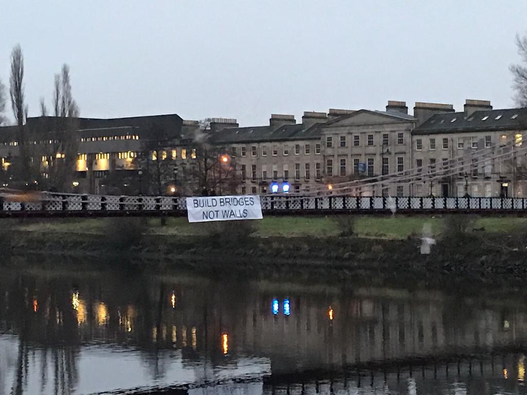 SCollins08's tweet photo. Glasgow's Build Bridges Not Walls banner #trump #inauguration #DisruptJ20 @STVNews @heraldscotland @BBCScotlandNews https://t.co/pX9cCZOUV0