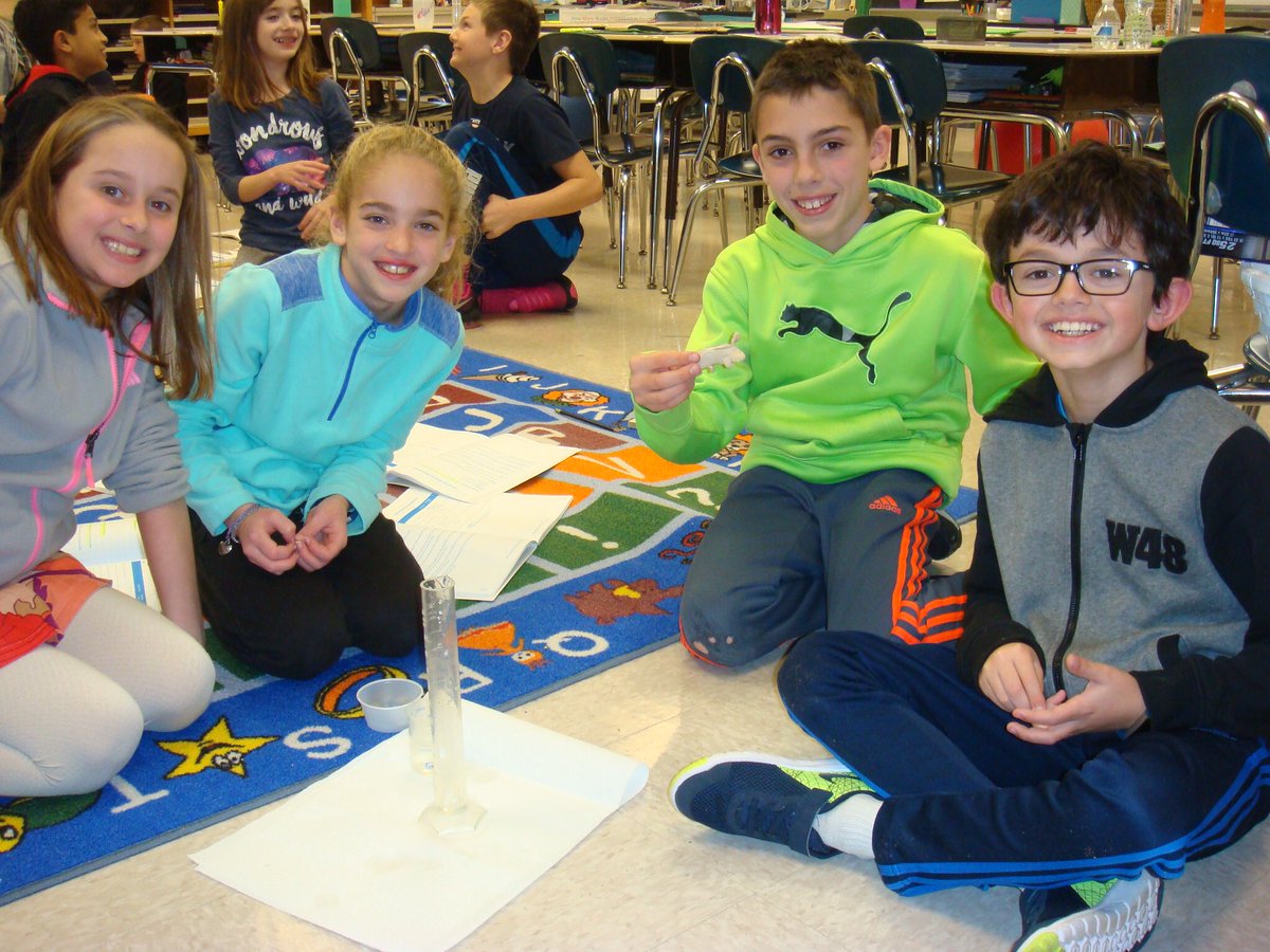 What does one learn about in fourth grade science?  Today was all about the concept of "displacement."  Impressive learning taking place!