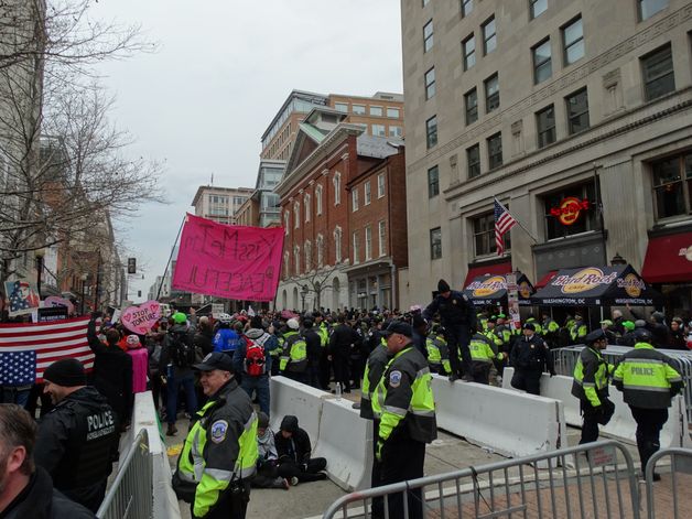 business's tweet photo. Protests in downtown DC https://t.co/f5oPyhxcMr #InaugurationDay https://t.co/mz6xHMiIqr
