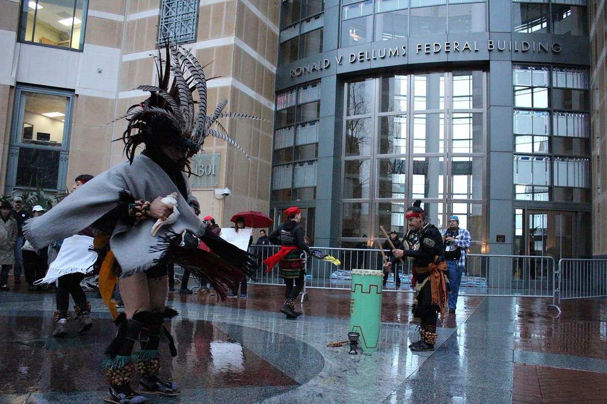 citizenkrans's tweet photo. Coatlicue Calpulli and Titeyolchicahuani dancers perform outside the #Oakland federal building to #ProtestTheInauguration @northoaklandnow https://t.co/Xypk4USzeY