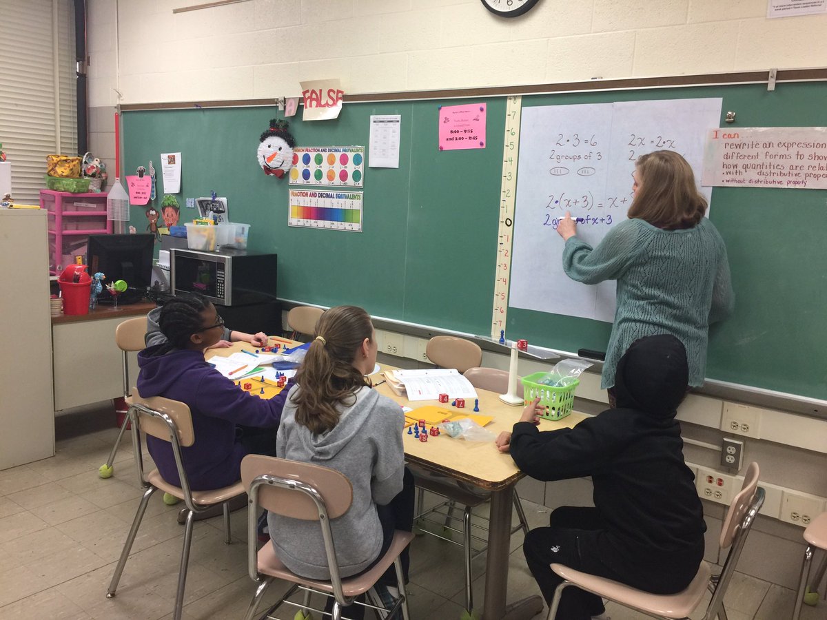 LBugdaBCPS's tweet photo. @MRMSlions Ss work on distributive property in a small group w/ @Kkhammom. 1 grp using hands on equations &amp; algebra tiles for the other! https://t.co/604rdl43wE