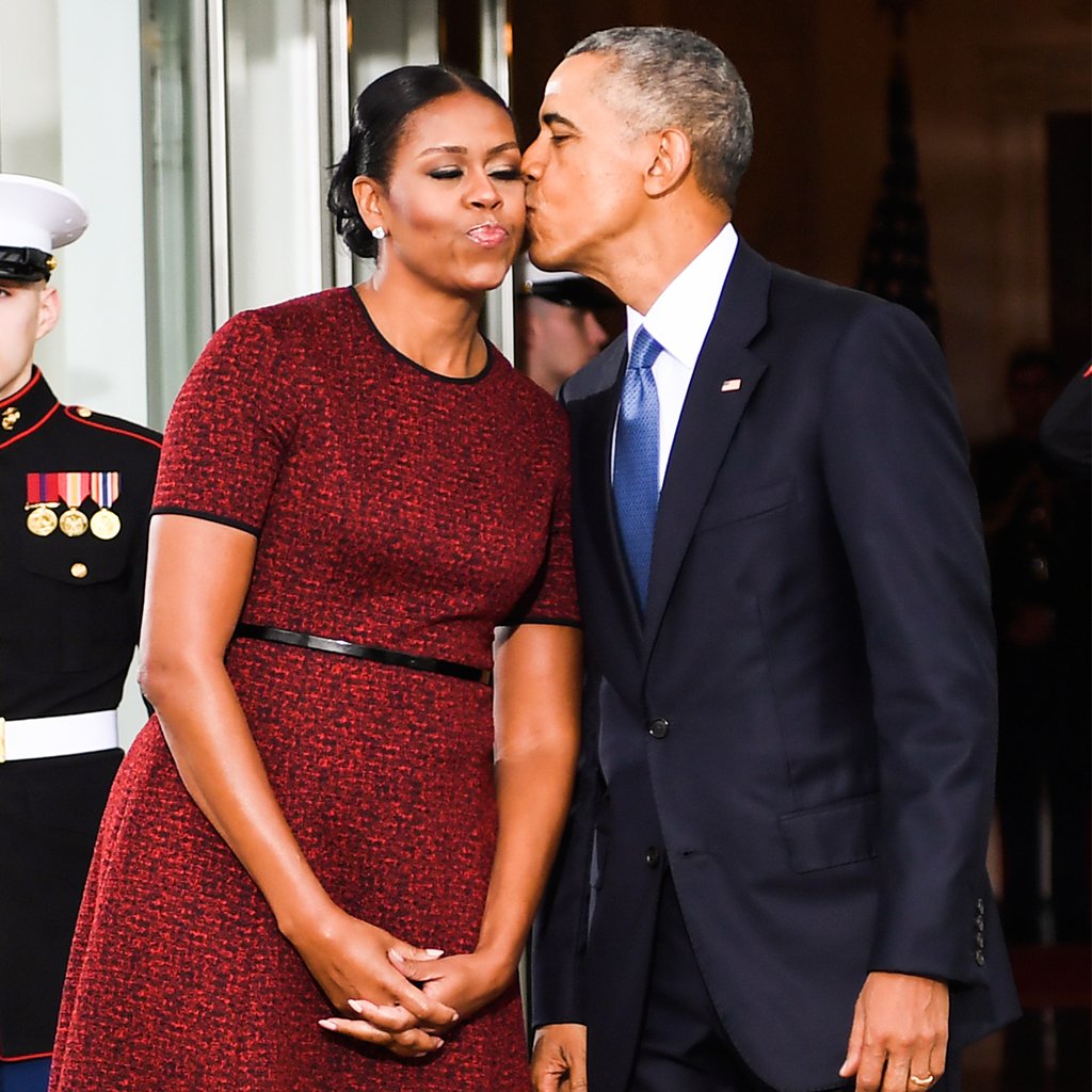 VanityFair's tweet photo. A sweet moment between the Obamas during #Inauguration. https://t.co/FCBf5Is7nX
