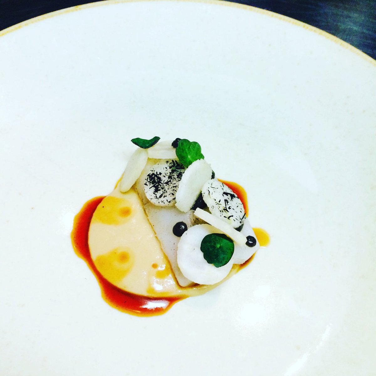 Poached cod, pickled n puréed celeriac, Apple, burnt aubergine, onion oil, hay ash.@pavlovaandcream @GoodfellowsLyns