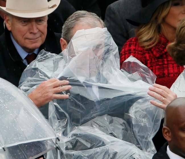Telegraph's tweet image. The rain was no match for former President George W. Bush during the #inauguration