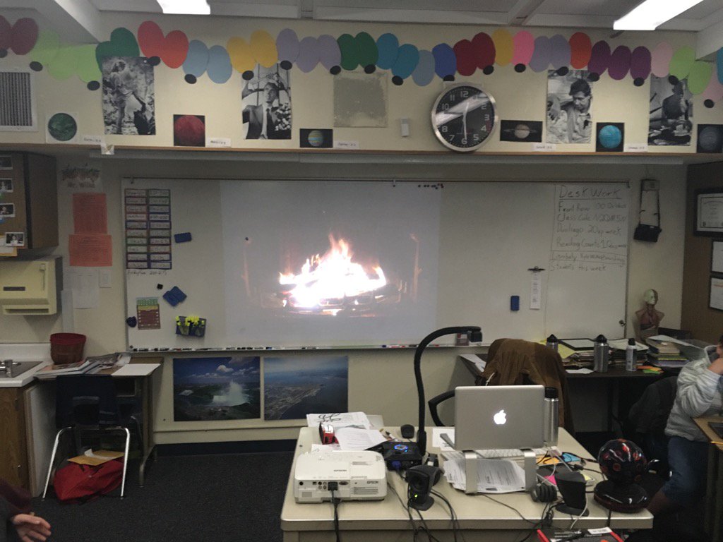 KyleJwilke's tweet photo. Had to start a fire in our classroom to stay warm #yulelog #digitalflames https://t.co/UA1oBgTZdK